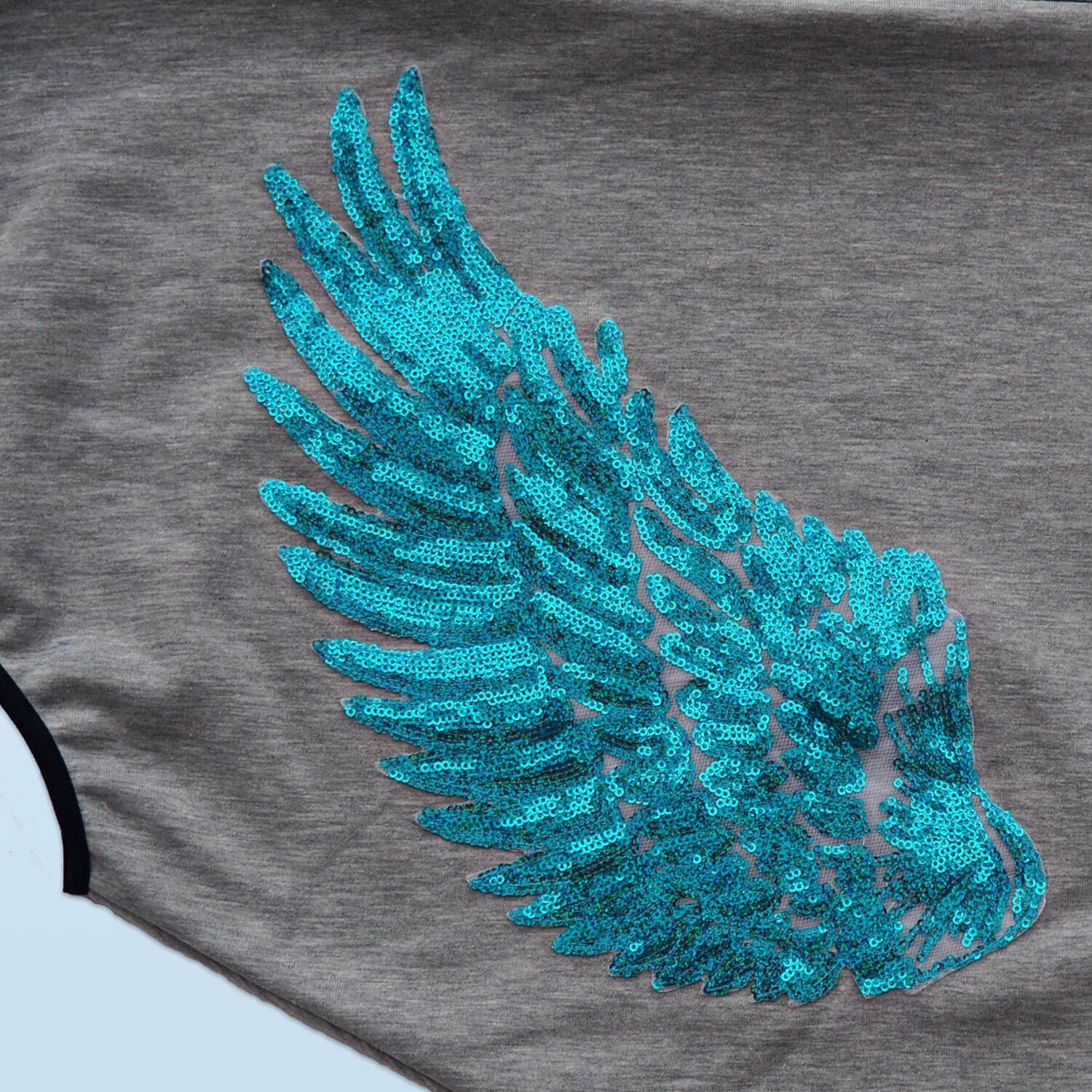 Sudadera alas de ángel azul
